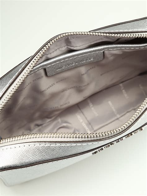 michael kors umhängetasche sklon clutch silber|Michael Kors wristlets.